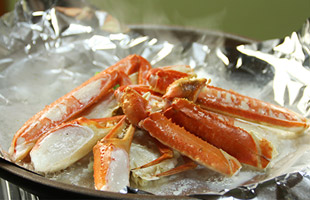 いながき名物『かにの酒蒸し焼き』の写真